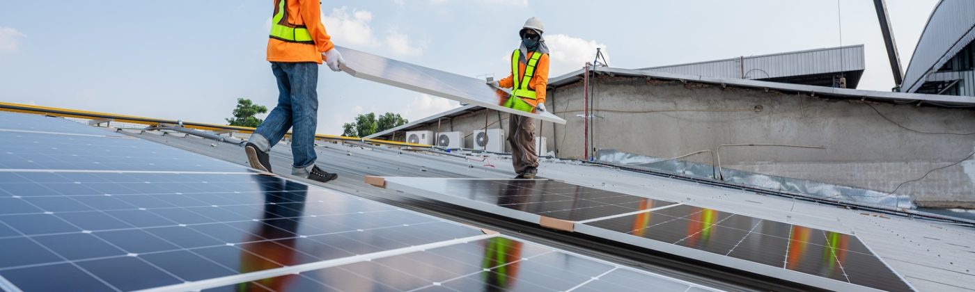 n-technicians-carrying-photovoltaic-solar-moduls-o-2025-07-09-02-59-53-utc